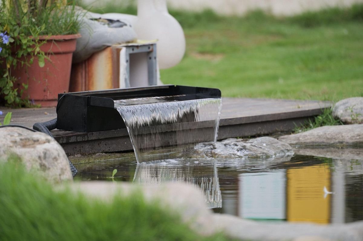 Solar Waterfall Pumps for Backyard Landscapes
